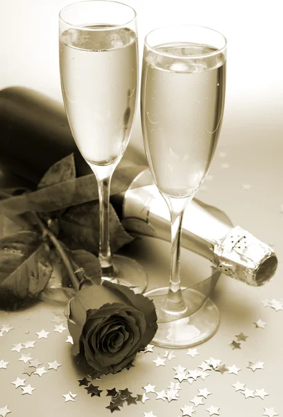 Champagne and red rose — Stock Photo, Image