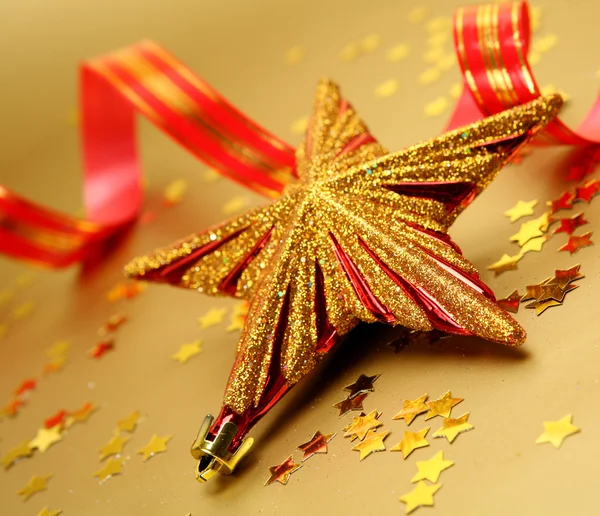 New Year's ster en confetti — Stockfoto