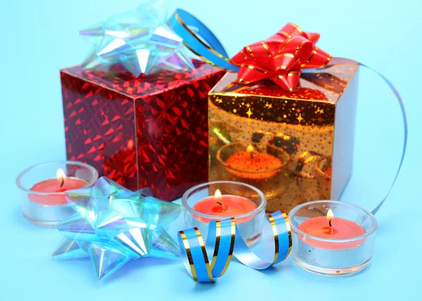 Gift boxes and candles — Stock Photo, Image