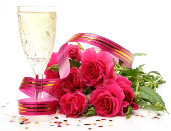 Wine and pink roses Stock Photo