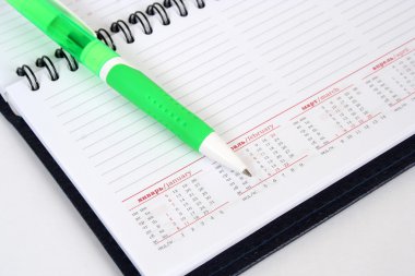 Kalem ve defter takvim ile