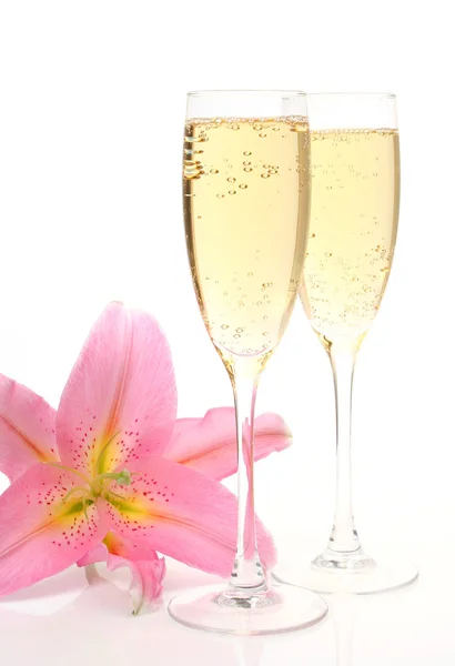 Champagne   with pink lily — Stock Photo, Image