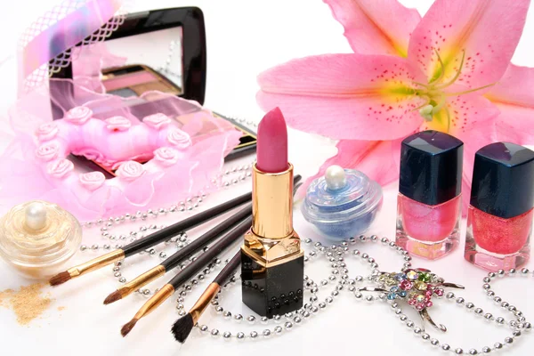 Decorative cosmetics with lily flower — Stock Photo, Image