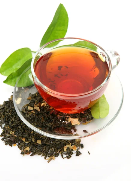 Cup with tea  and green leaf — Stock Photo, Image