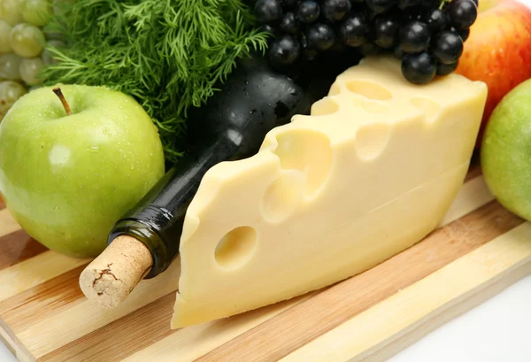 Fresh ripe fruits, cheese and wine — Stock Photo, Image