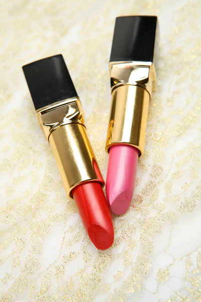 Rosa und roter Lippenstift — Stockfoto