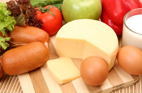 Vegetables, fruits, cheese and sausage — Stock Photo, Image