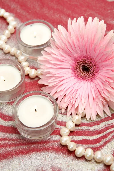 Flower with  candles and necklace — Stock Photo, Image