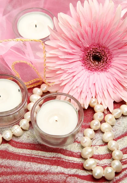Flower with  candles and necklace — Stock Photo, Image