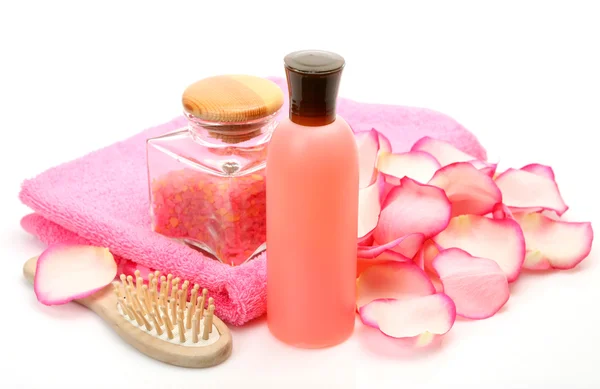 Pink towel with body care subjects — Stock Photo, Image