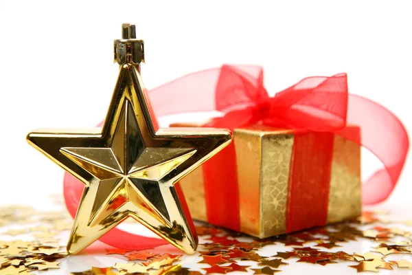 Gold star with holiday present box — Stock Photo, Image