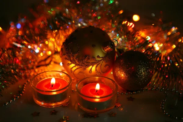 Decorative spheres and candles — Stock Photo, Image