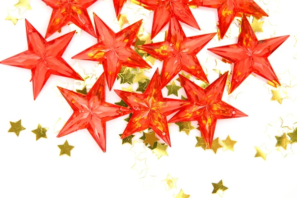 Estrelas decorativas e confetes brilhantes — Fotografia de Stock