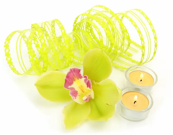 Flower and burning candles — Stock Photo, Image