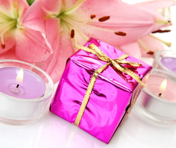 Box with a gift and flowers — Stock Photo, Image