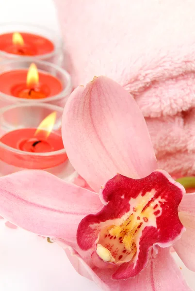 Towel, candles and flower Royalty Free Stock Images