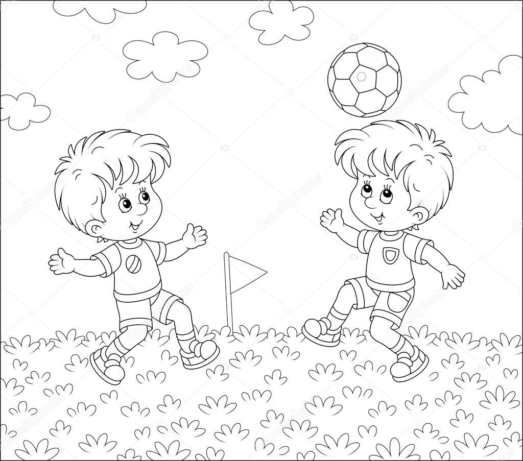 Little football players with a ball at a match or training on a sports field on a summer day, black and white outline vector cartoon illustration for a coloring book page