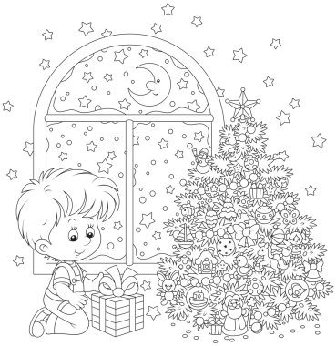 bir Noel hediyesi olan çocuk