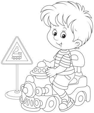 Boy on a toy train clipart