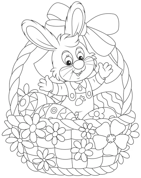 Conejo de Pascua en una cesta — Vector de stock
