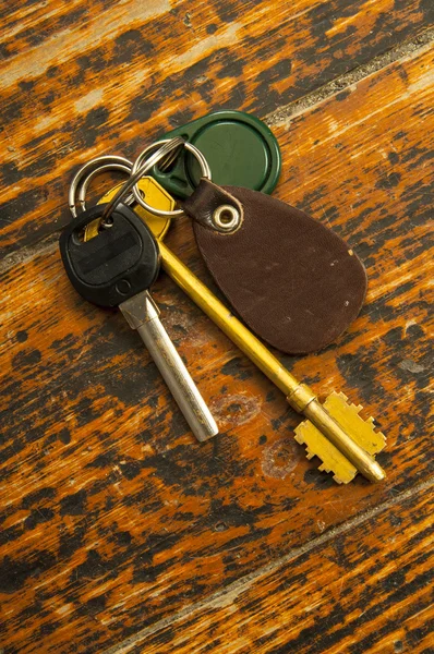 Bunch of keys on wood — Stock Photo, Image