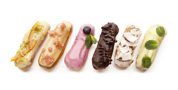 Exquisite cream dessert eclairs — Stock Photo, Image