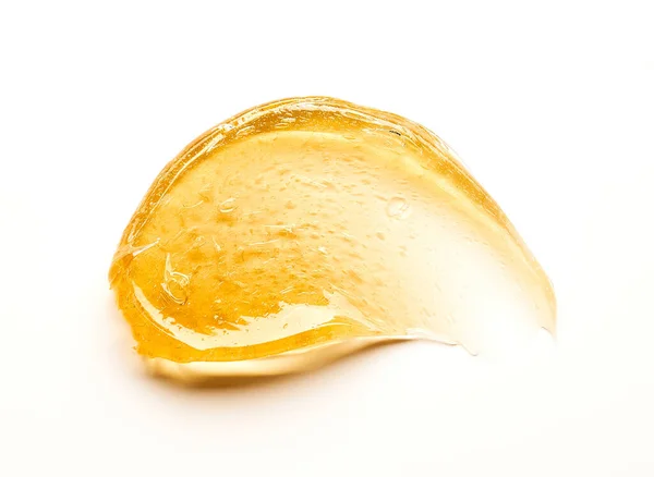 Mancha Amarilla Transparente Crema Facial Miel Dorada Aislada Sobre Fondo —  Fotos de Stock