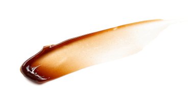 Çikolata renkli jel lekesi ve doku. Beyaz zemin üzerinde kozmetik jel veya karamel şurubu