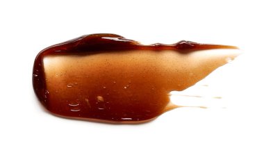 Çikolata renkli jel lekesi ve doku. Beyaz zemin üzerinde kozmetik jel veya karamel şurubu