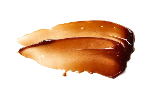 Chocoladekleurige Gel Uitstrijken Textuur Cosmetische Gel Karamelsiroop Witte Achtergrond — Stockfoto