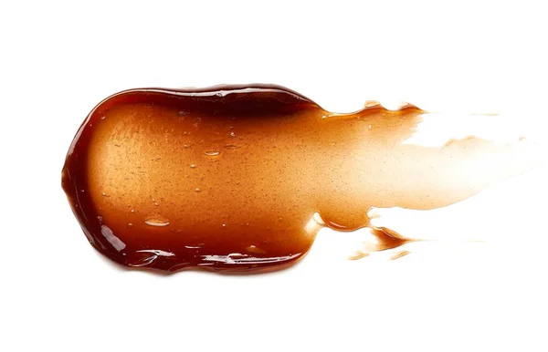 Chocoladekleurige Gel Uitstrijken Textuur Cosmetische Gel Karamelsiroop Witte Achtergrond — Stockfoto