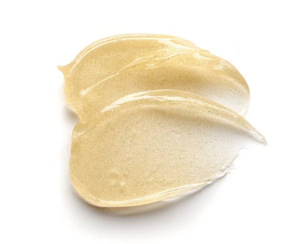 Transparent Smear Texture Golden Cosmetic Gel White Background — Foto Stock
