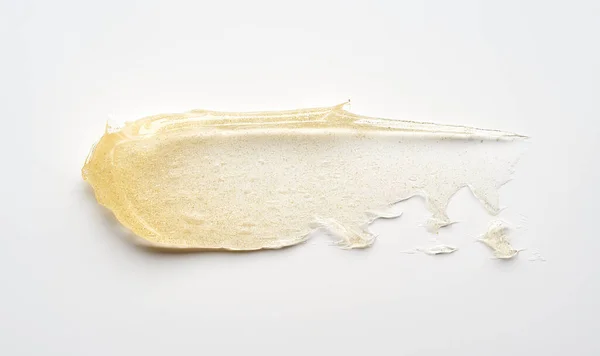 Beyaz Arka Planda Altın Kozmetik Jelin Şeffaf Lekesi Dokusu — Stok fotoğraf