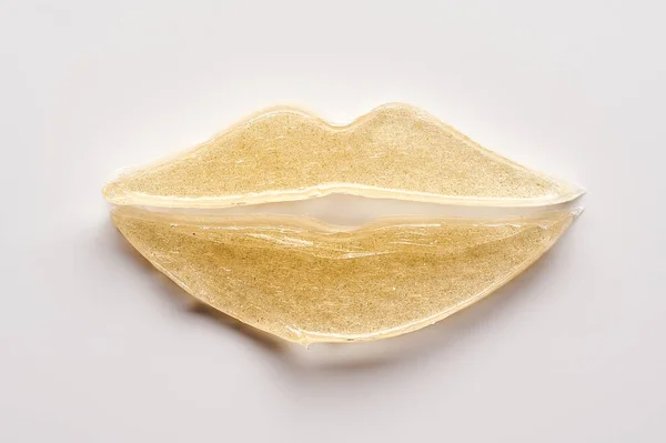 Mancha Transparente Textura Gel Cosmético Dorado Sobre Fondo Blanco — Foto de Stock