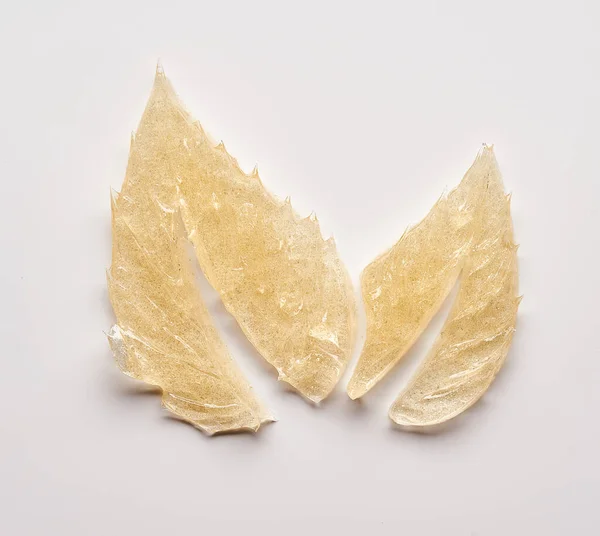 Transparent Smear Texture Golden Cosmetic Gel White Background — Stock Photo, Image