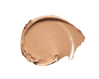 Beyazlar üzerinde izole edilmiş bej renkte renkler ve makyaj temeli dokusu veya akrilik boya