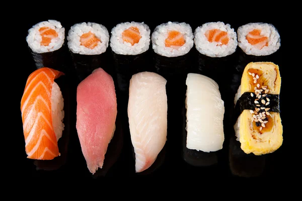 Sushi rolls and sashimi — Stock Photo, Image