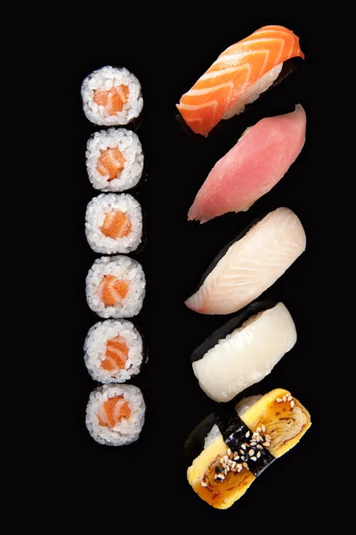 Sushi rolls and sashimi — Stock Photo, Image