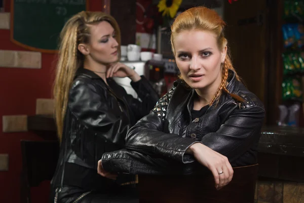 Two beautiful rock girl friends at rock club — Stock Photo, Image