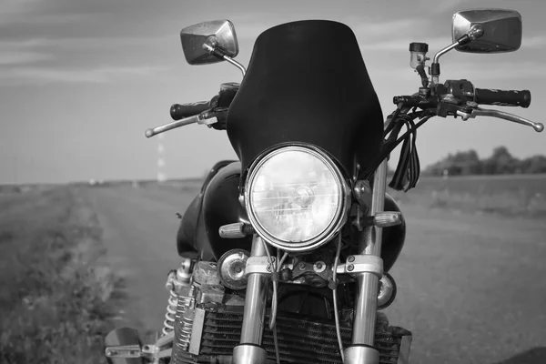 Motorcycle on a empty road — Stock Photo, Image