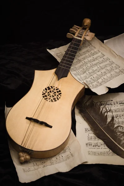 Renaissance lute (citole) with musical notes — Stock Photo, Image