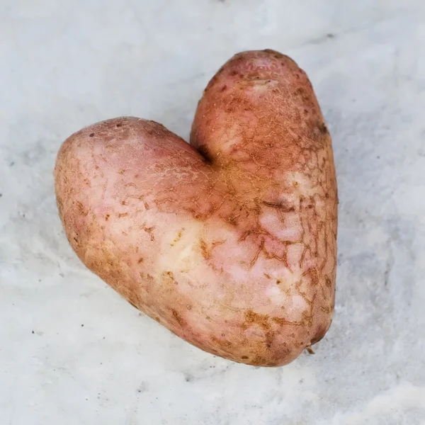 Potatoes in the form of heart — Stock Photo, Image