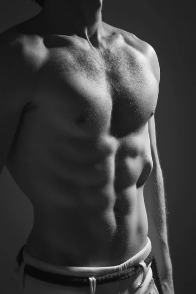 Muscular torso of athletic man — Stock Photo, Image