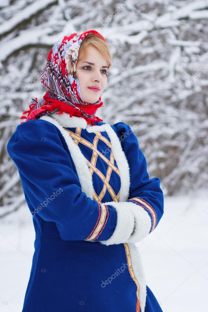 Russian beauty woman in traditional clothes