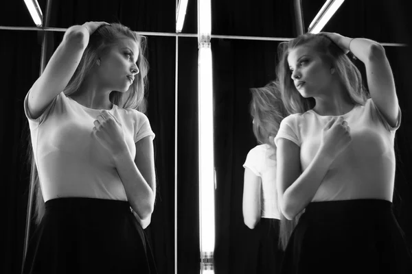 Sexy girl and her reflection in mirror table — Stock Photo, Image