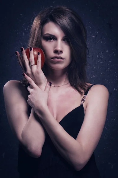 Lonely mad woman with red apple — Stock Photo, Image