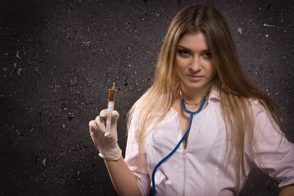 Nurse with a disposable syringe — Stock Photo, Image