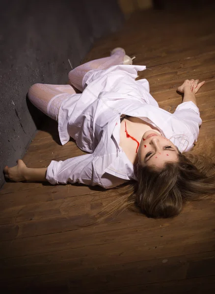 Dead nurse lying on the floor — Stock Photo, Image