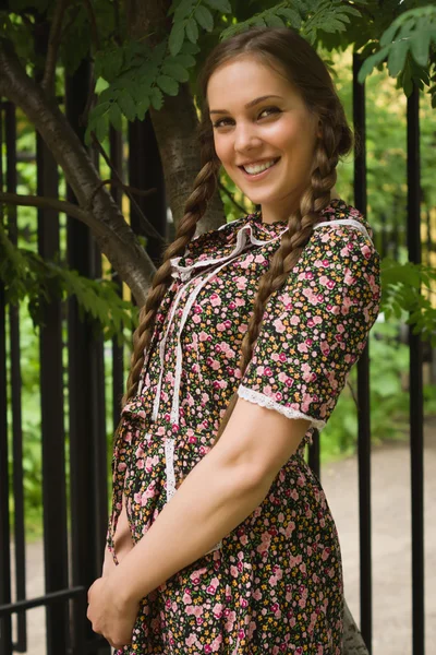 Beautiful soviet girl in retro style in the park — Stock Photo, Image