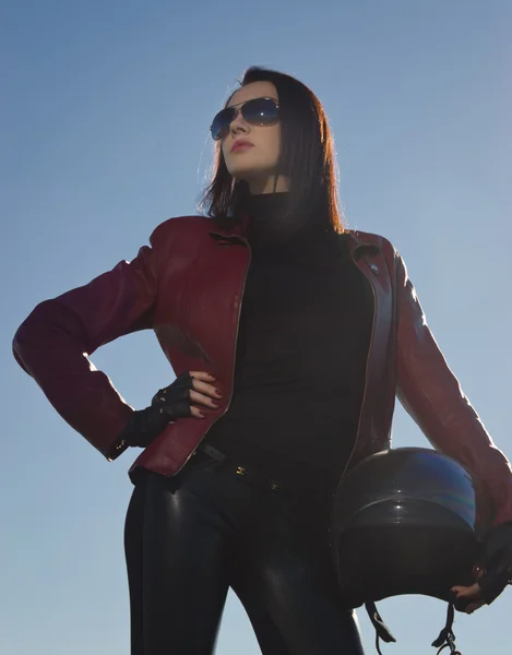 Biker girl in a leather jacket on a motorcycle — Stock Photo, Image